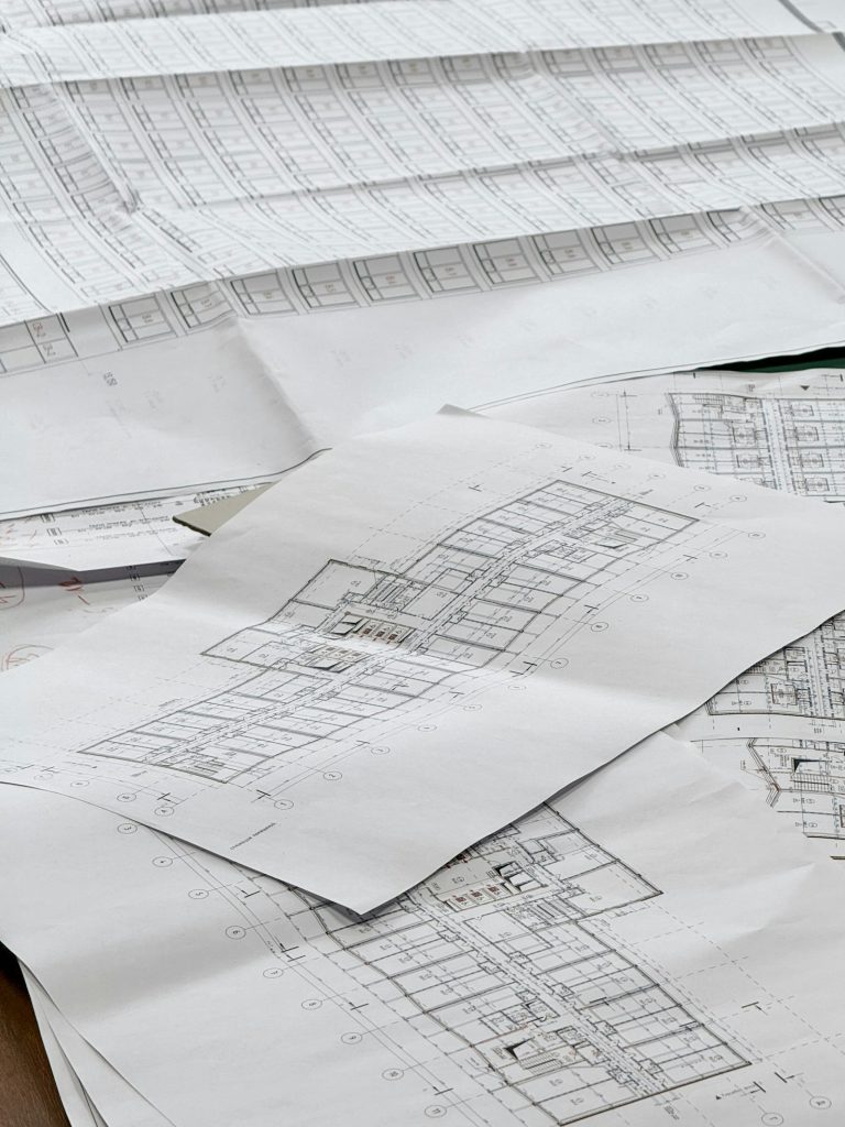 Construction blueprints spread out