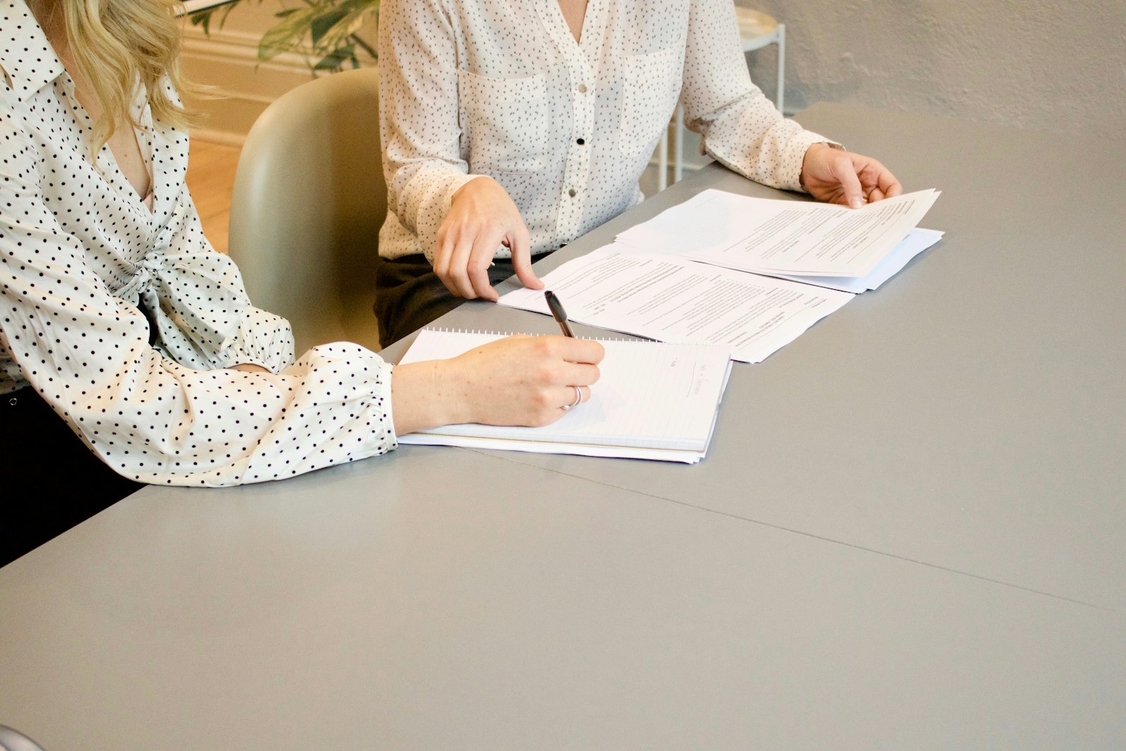 Employee signing a document