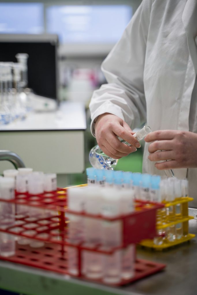 Lab technician handling a sample