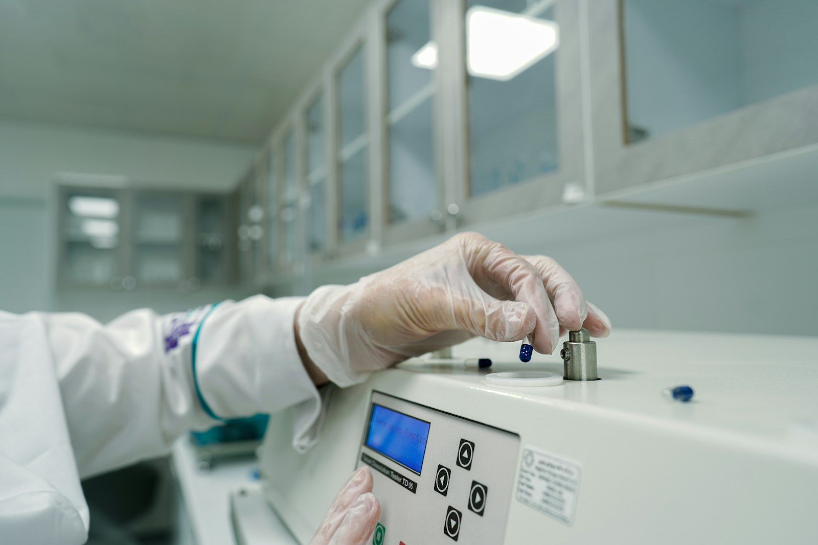 Technician working on lab equipment
