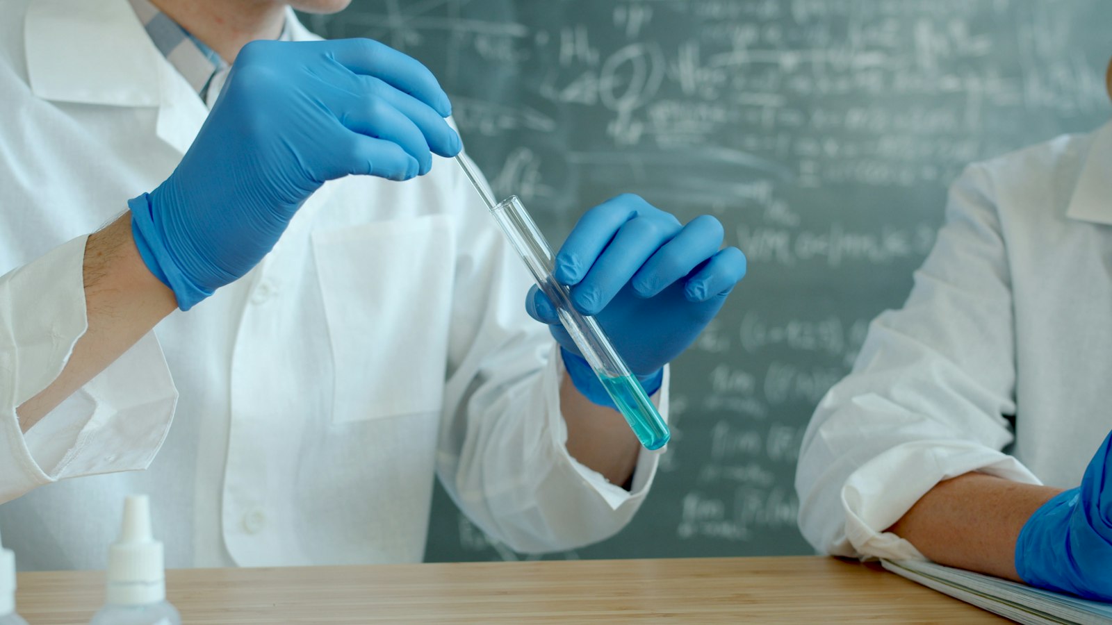 Lab technicians processing test samples
