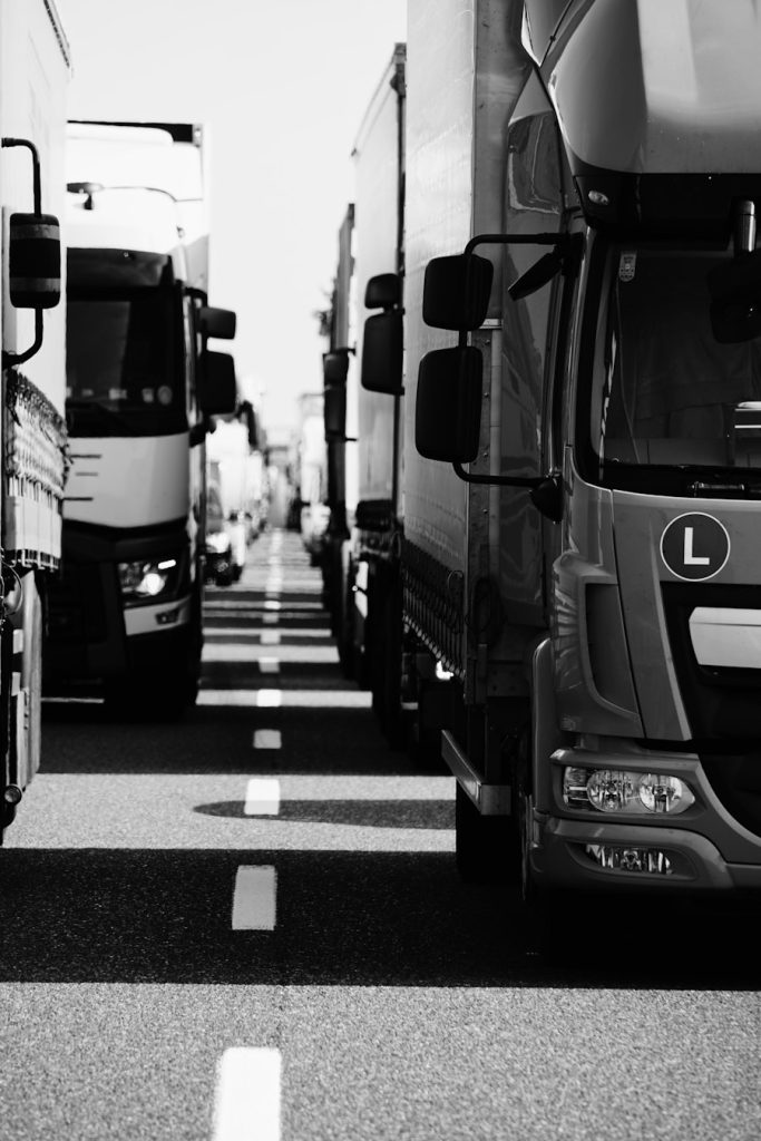 Line of semi-trucks on a highway