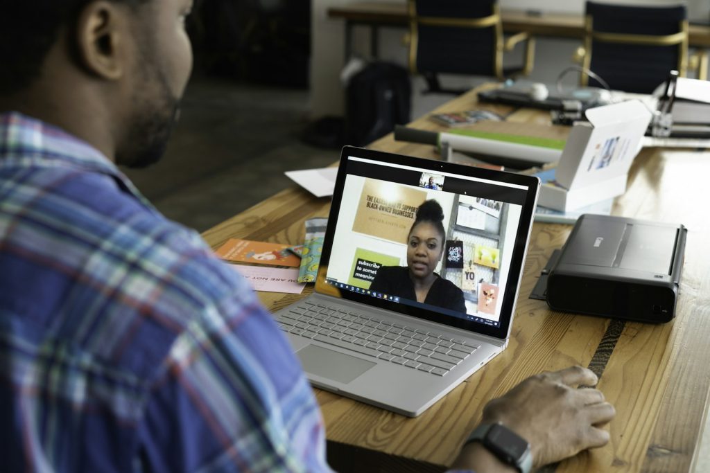 Person reviewing records on a laptop