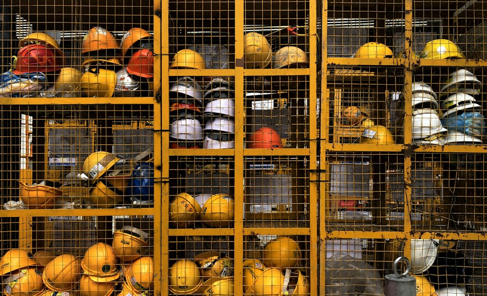 Rack of yellow hard hats