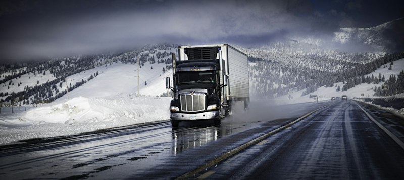 Semi-truck on a snowy road