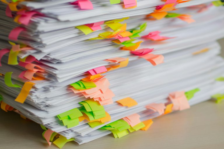 Stack of papers marked with tabs