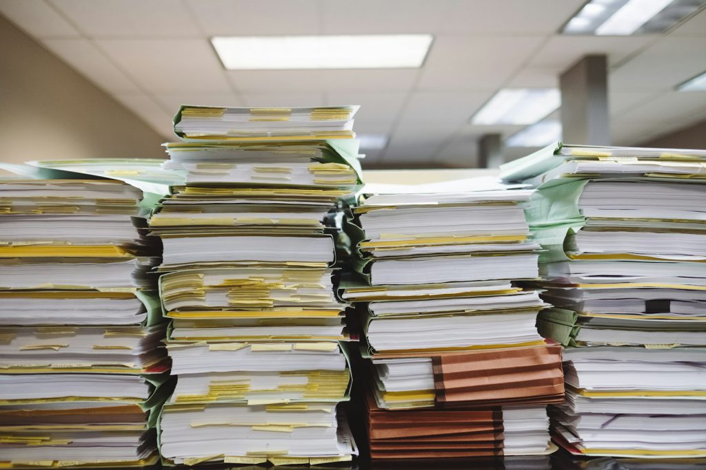 Stacks of documents and file folders