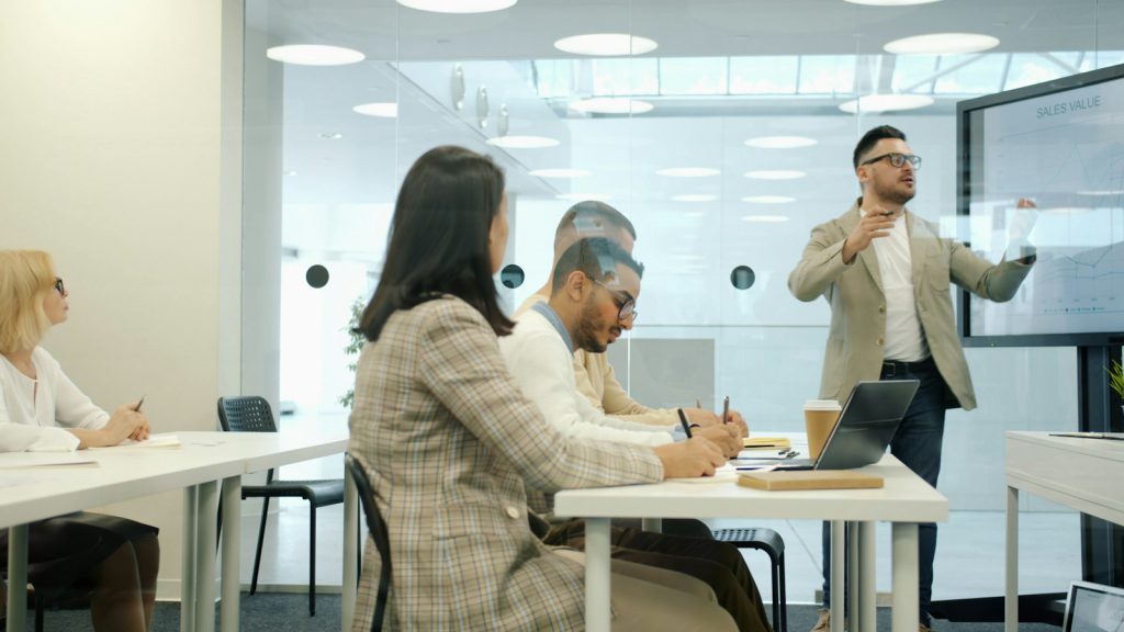 Trainer presenting in a meeting room