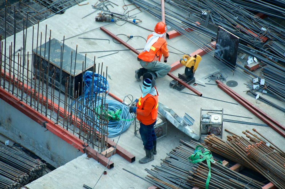 Two construction workers on the job