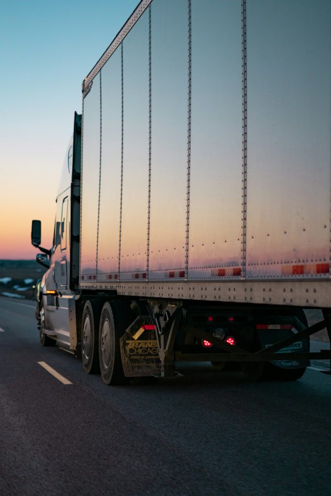 White freight truck on the road