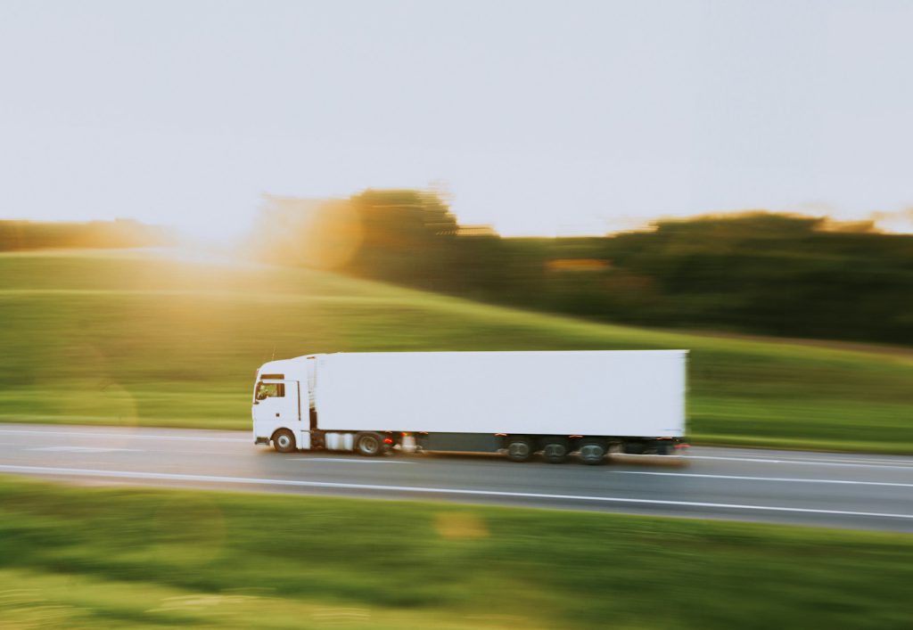 White semi-truck on a rural road